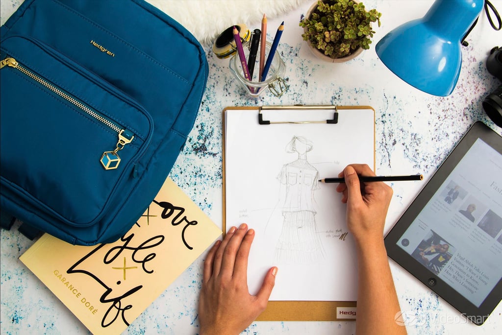 Person drawing clothes with a pencil