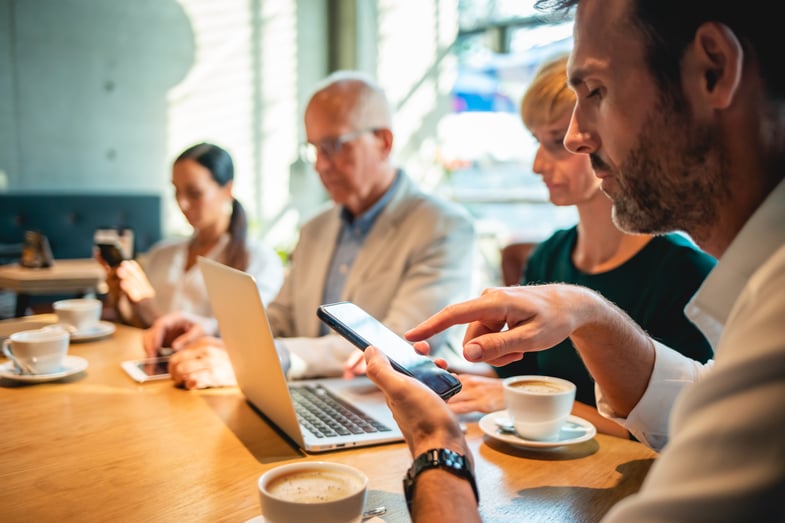 technology-devices-in-hands-of-business-people-at-2024-10-31-04-15-46-utc